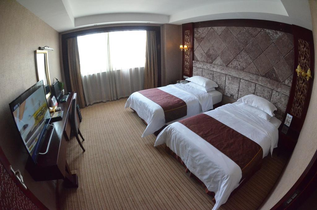 Xiamen Wanjia Oriental Hotel Quarto foto